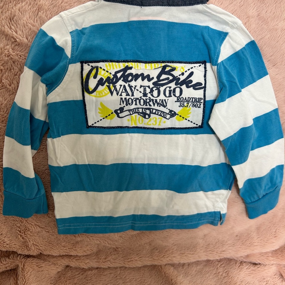 Blue and White Long Sleeve Striped Tee with Graphic Patch